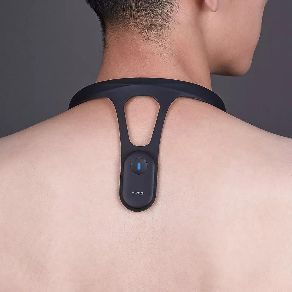Smart Posture Correction Brace worn on the back to improve posture and spinal alignment.